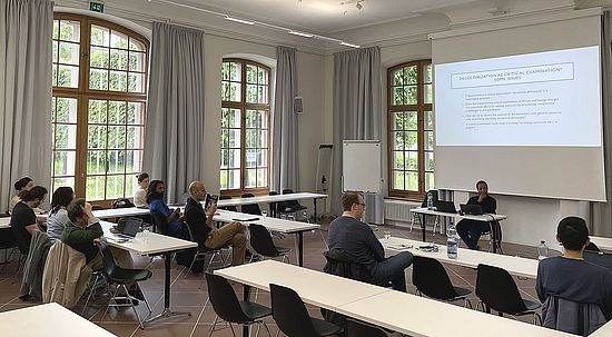 Students and Europainstitut members listen to contributions during the Q&A