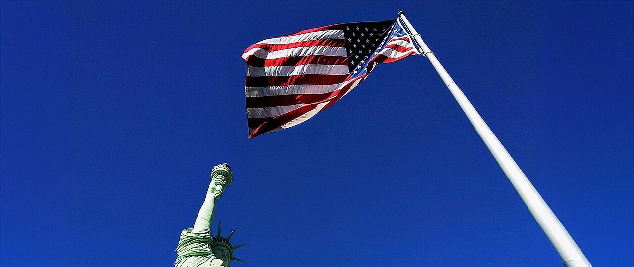 Statue of liberty and US flag