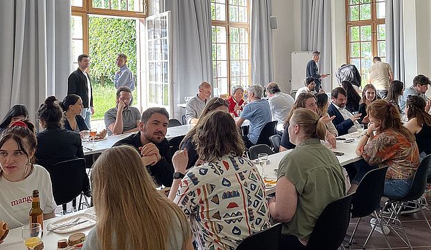 Dinner in the lecture hall of the Orangerie building